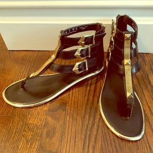 Fergie Black Gold Flat Gladiator Sandal 8M